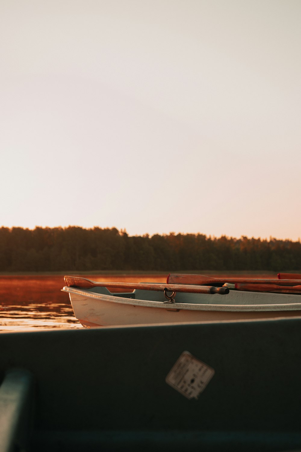 white and brown boat on water during daytime