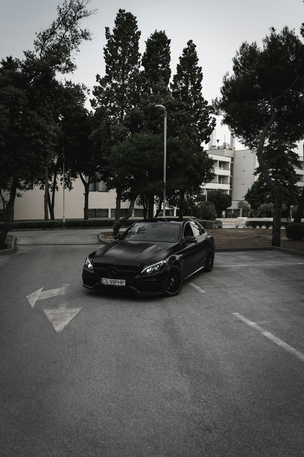 black porsche 911 parked on road during daytime