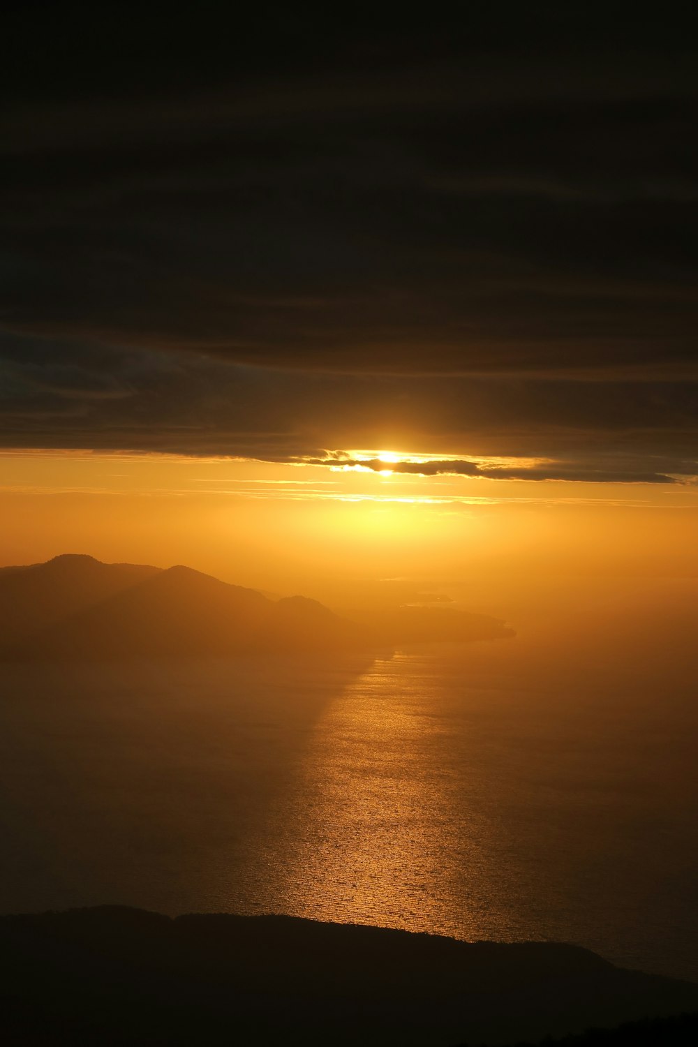 silhouette of mountains during sunset