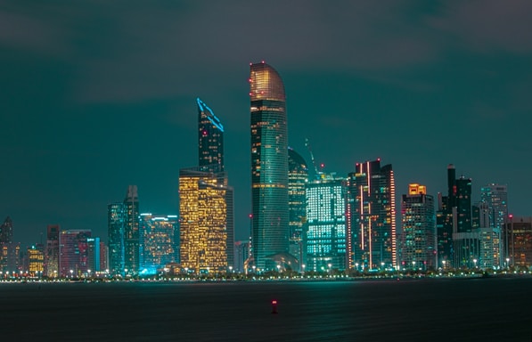 city skyline during night time
