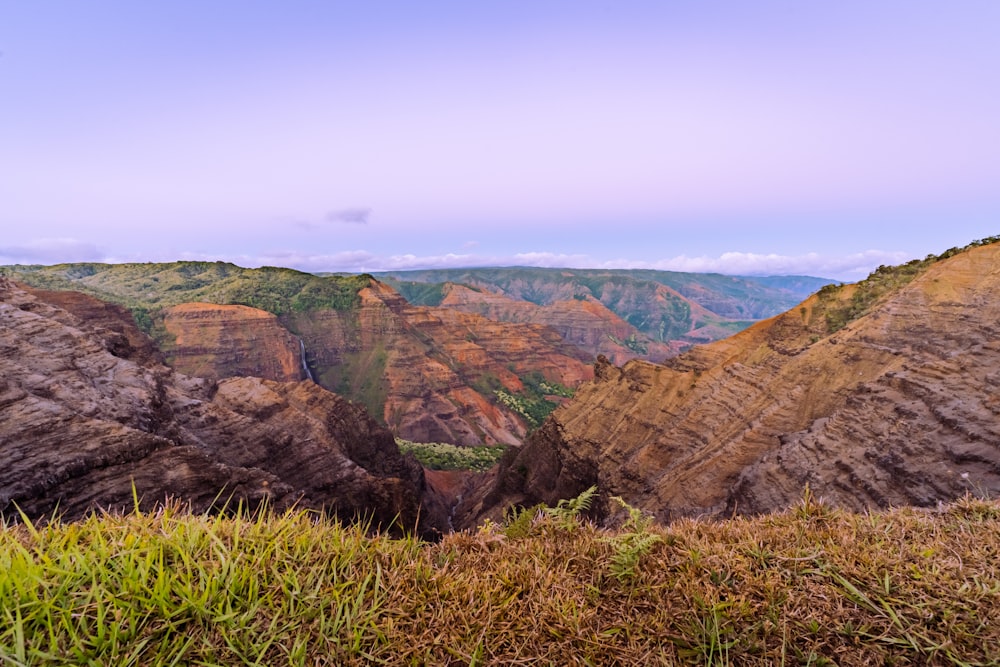 brown rock formation under blue sky during daytime