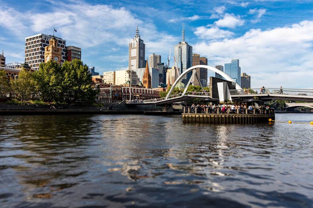 white bridge over river during daytime