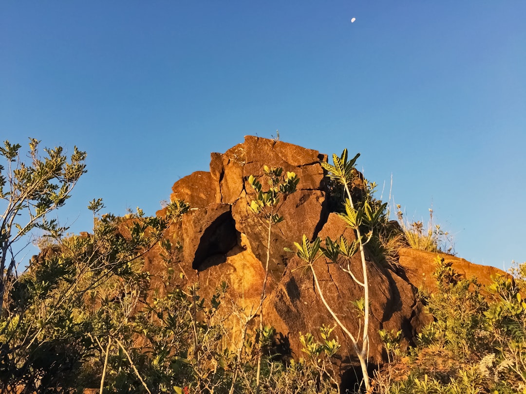 brown rock formation under blue sky during daytime