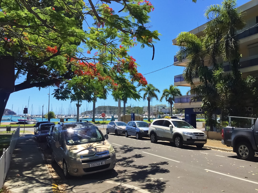 cars parked on parking lot during daytime