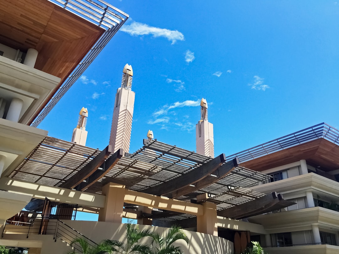 white and brown concrete building under blue sky during daytime