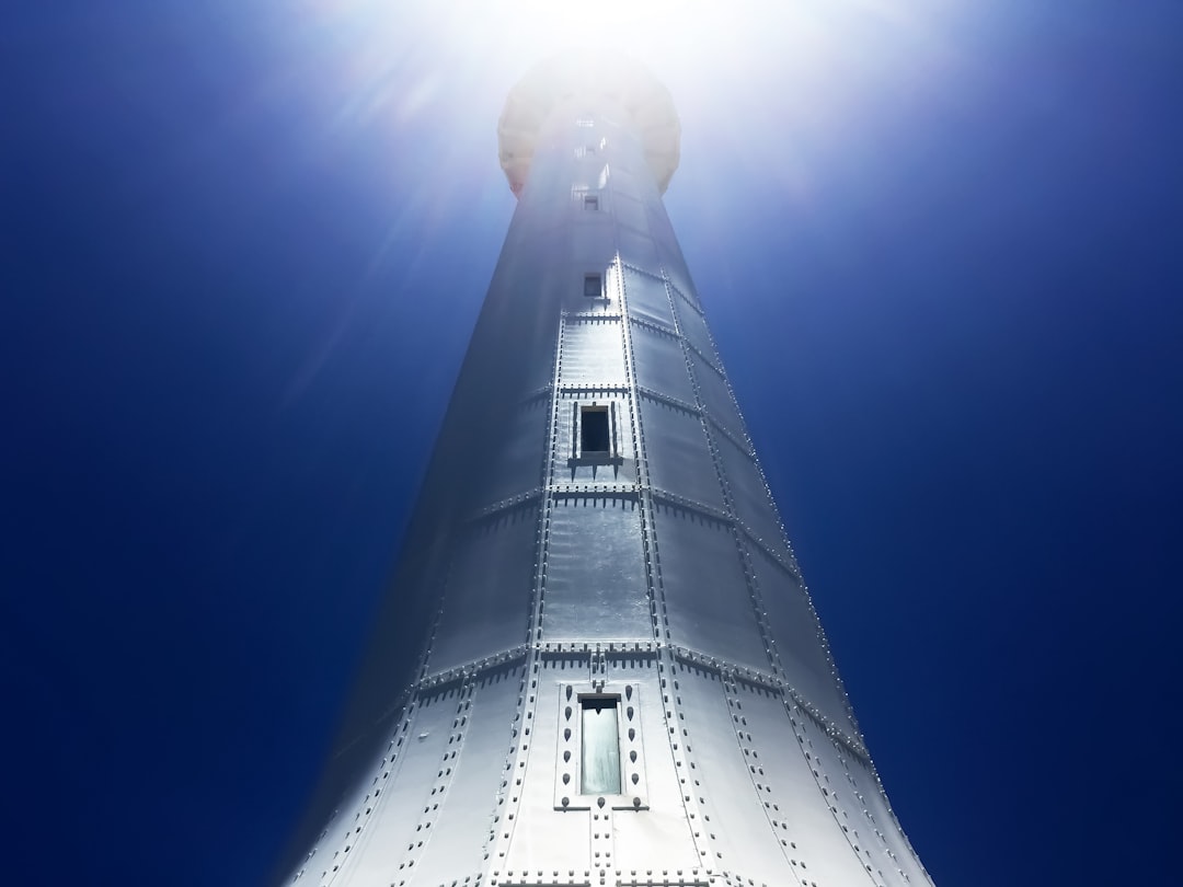 white and black tower under blue sky during daytime