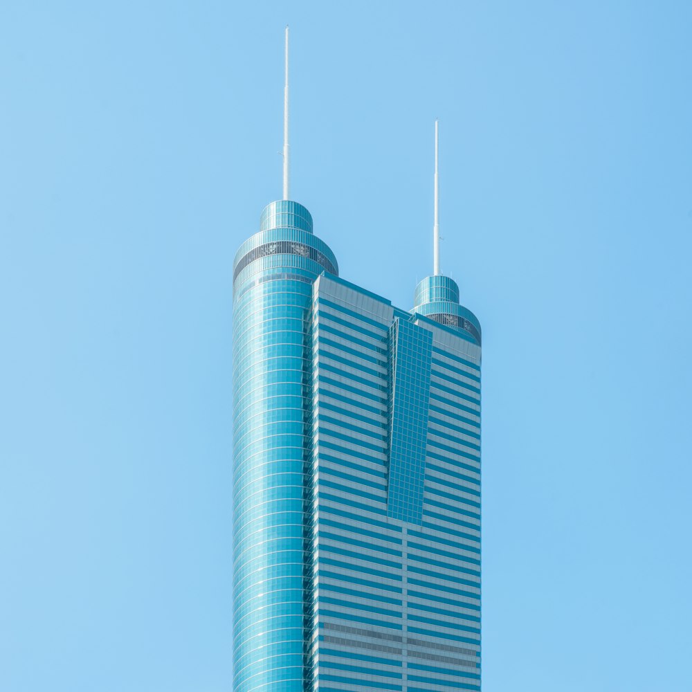 gray high rise building under blue sky during daytime