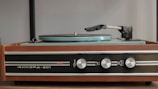 A vintage record player table with elegant details.