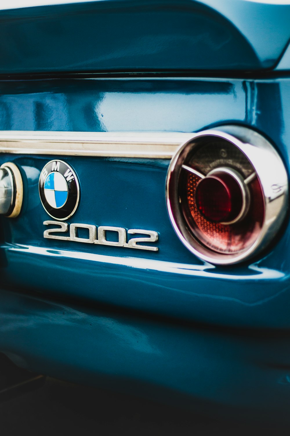 blue and silver bmw car