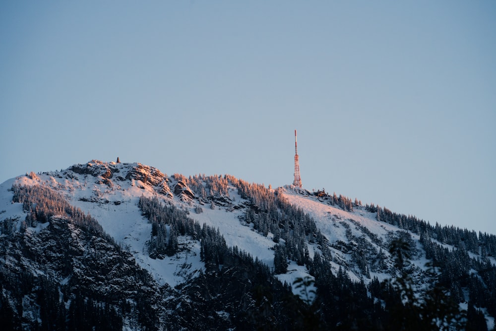 snow covered mountain during daytime