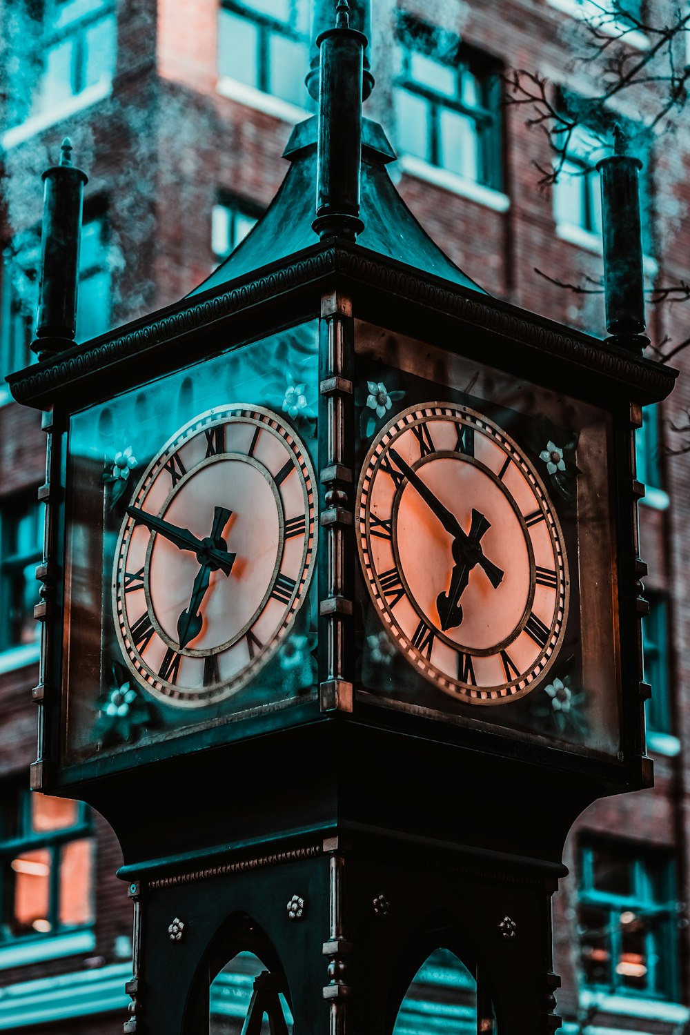 black wooden analog clock at 10 30