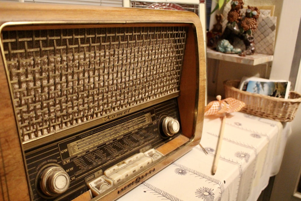 brown and white radio on white paper