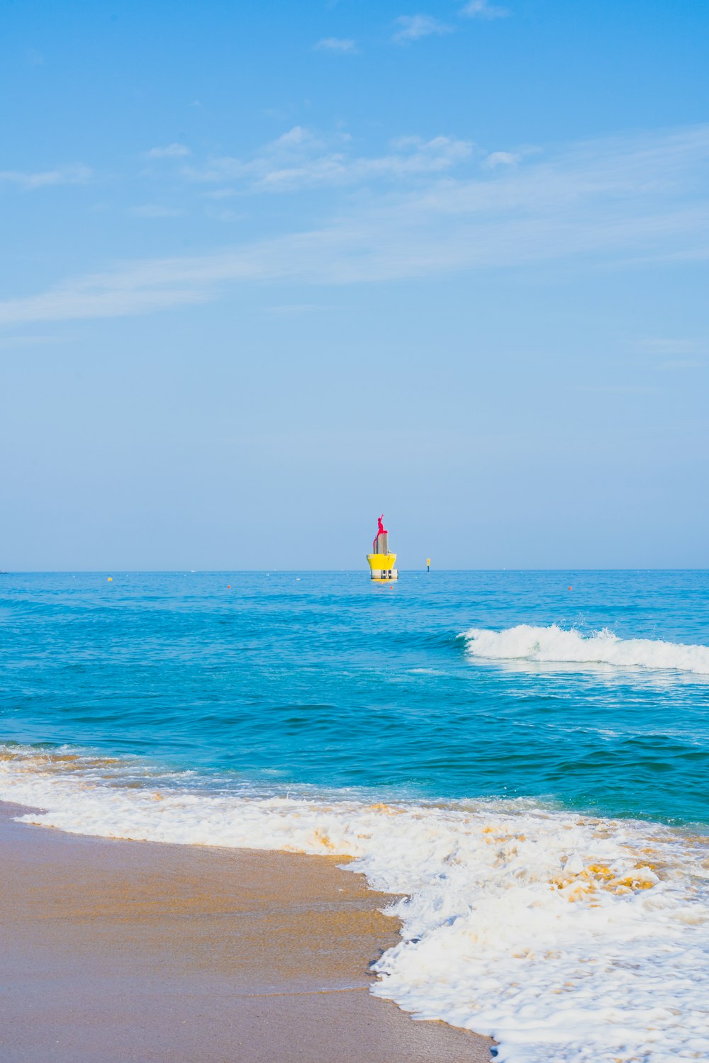 person surfing on sea waves during daytime