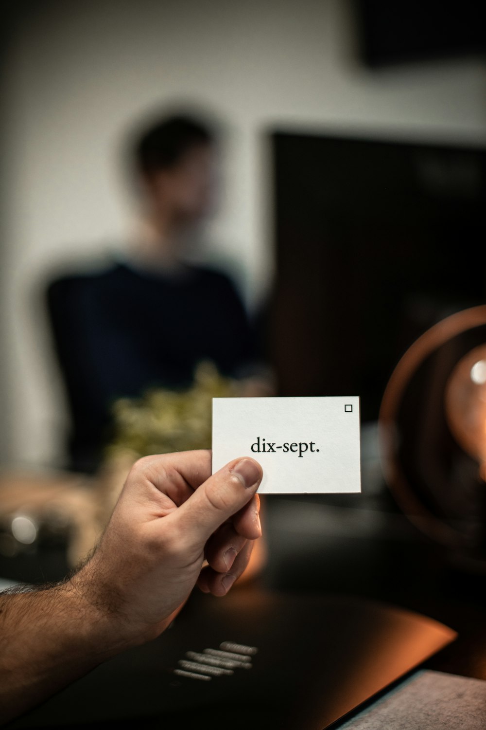 person holding white printer paper