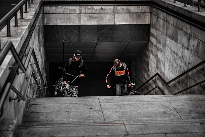active man with bicycle in the city