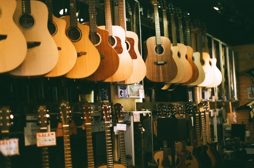 brown acoustic guitars on display