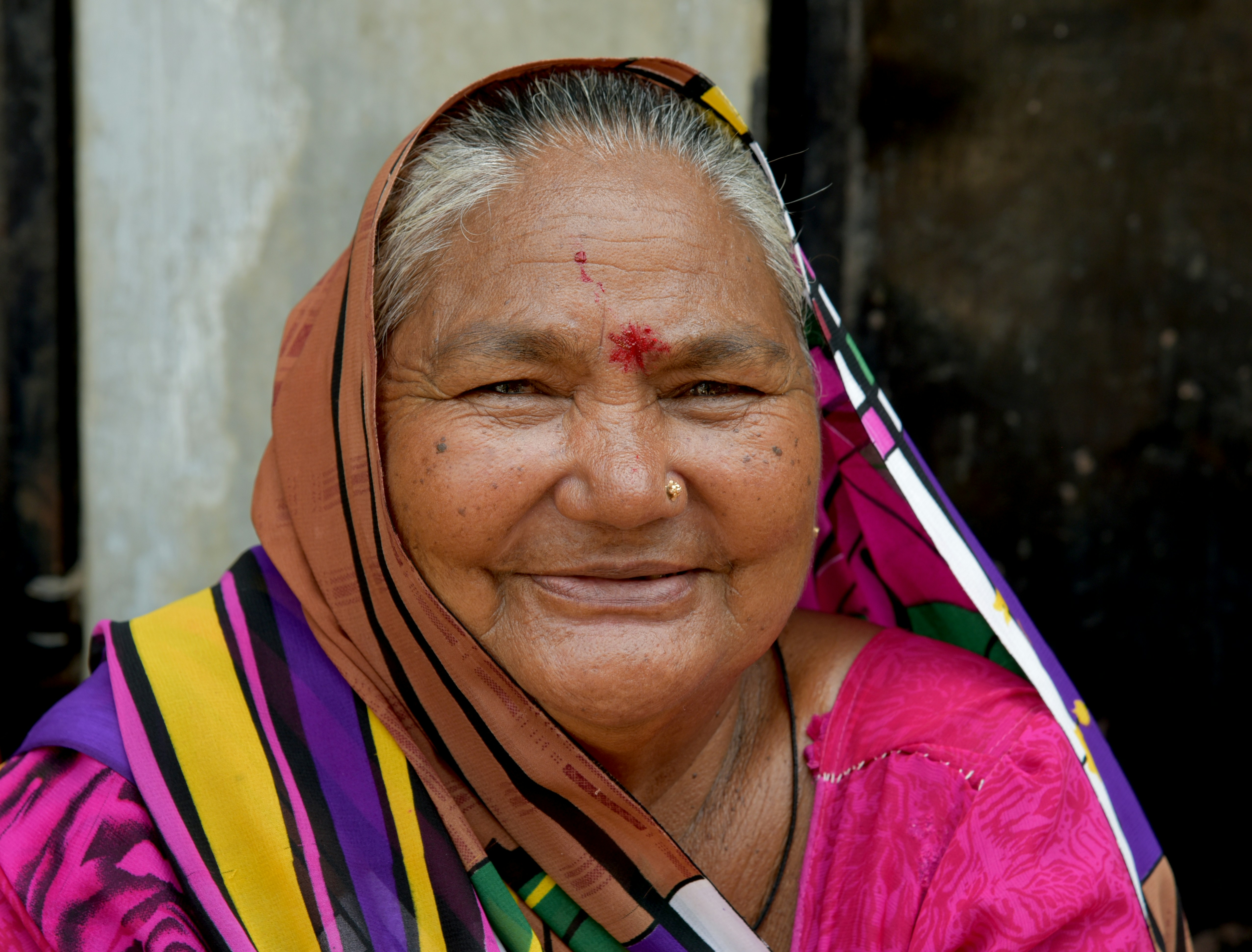 Confident woman in colorful sari