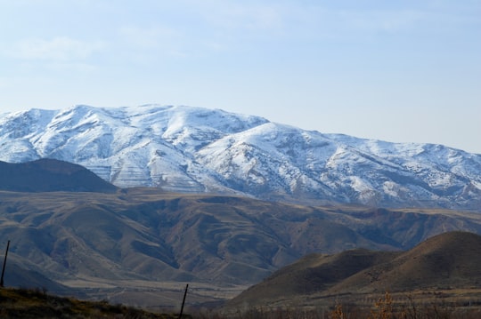 snow covered mountains during daytime in Sisian Armenia