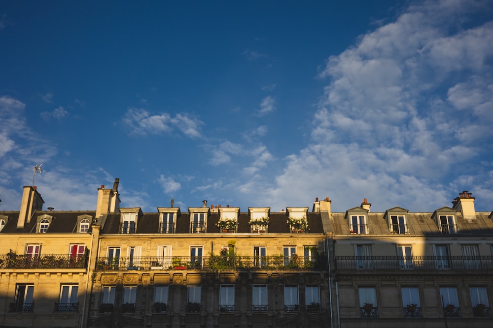 brown concrete building under blue sky during daytime