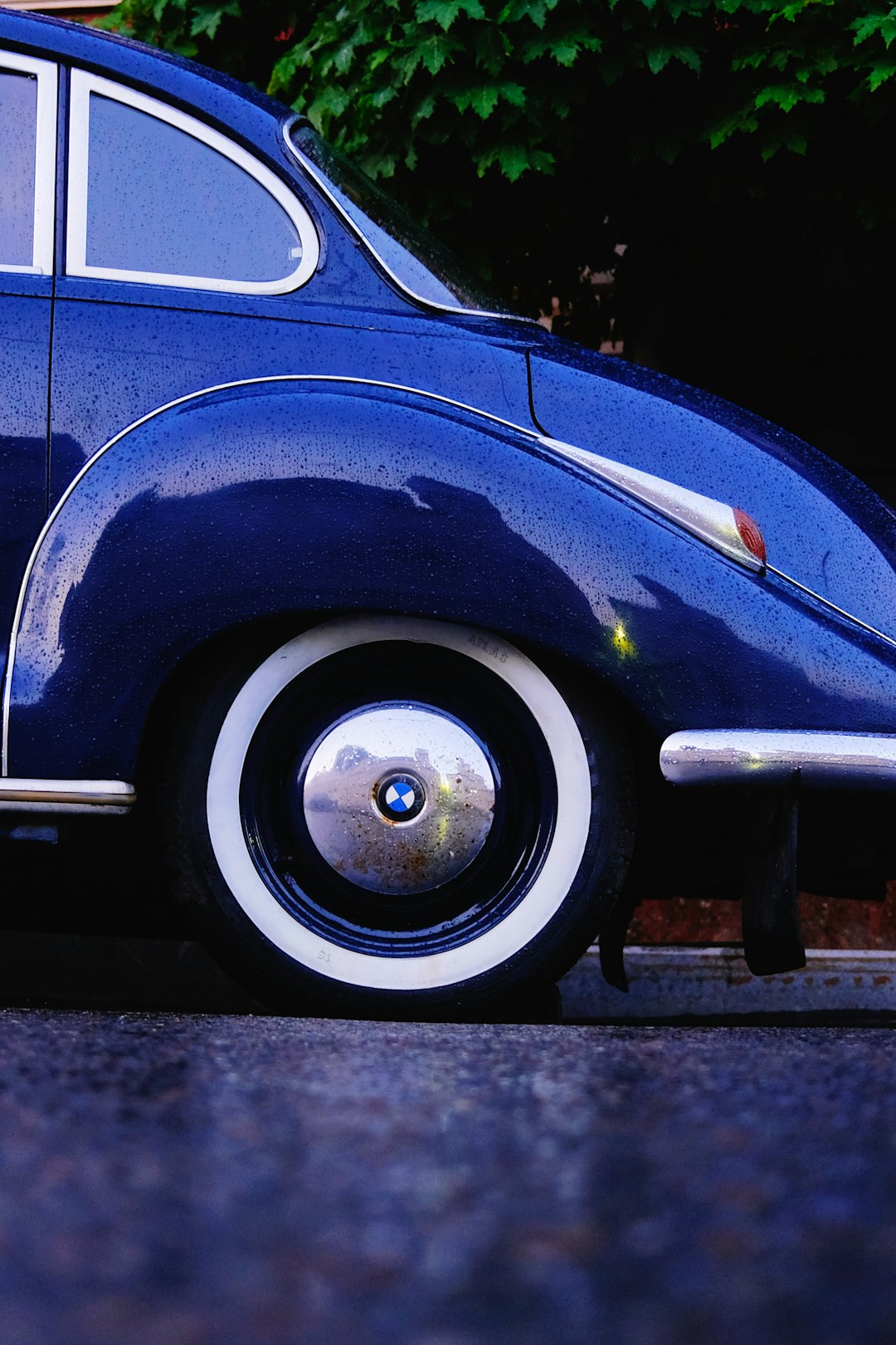 blue volkswagen beetle on road during daytime