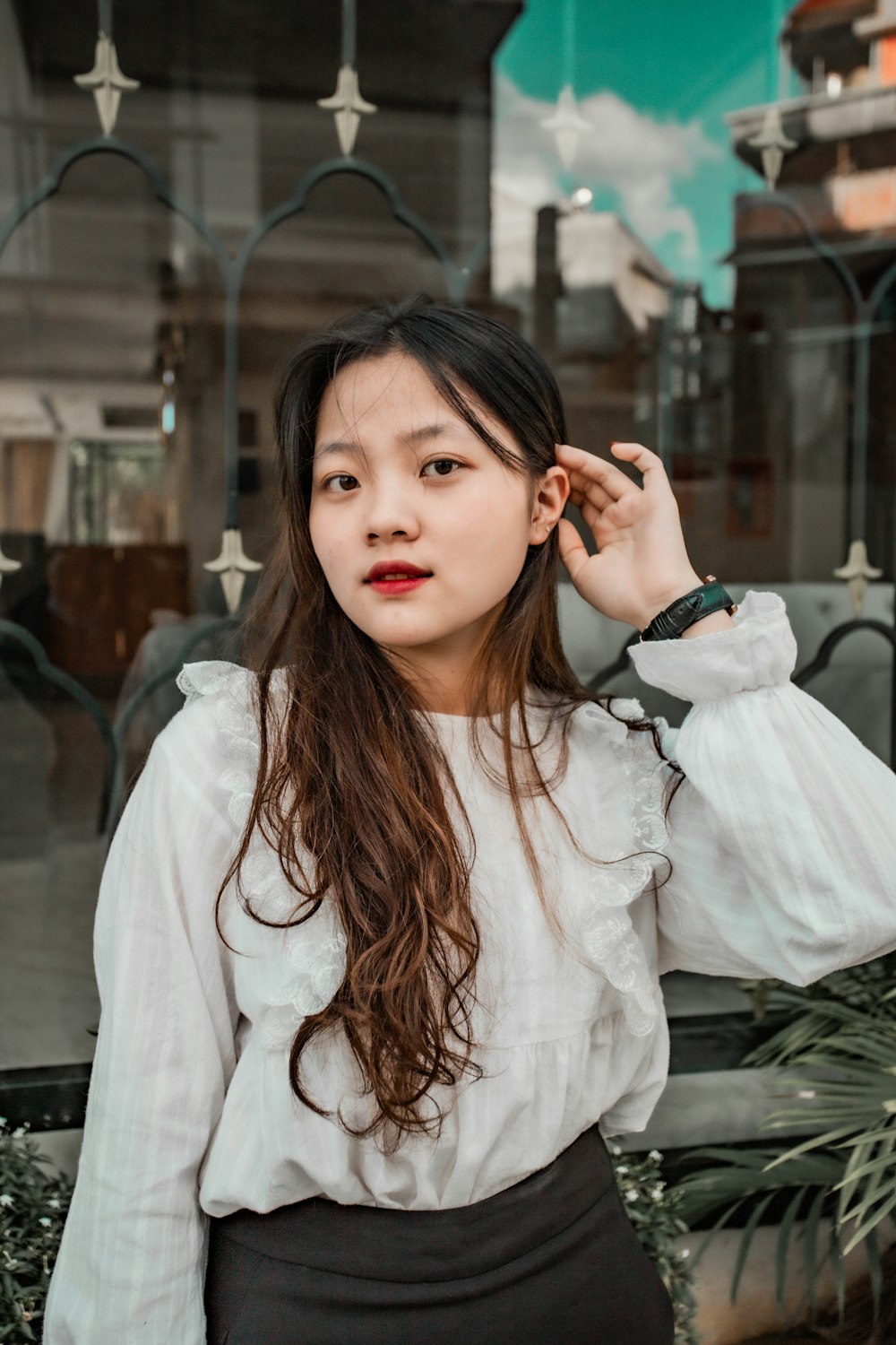 woman in white long sleeve shirt