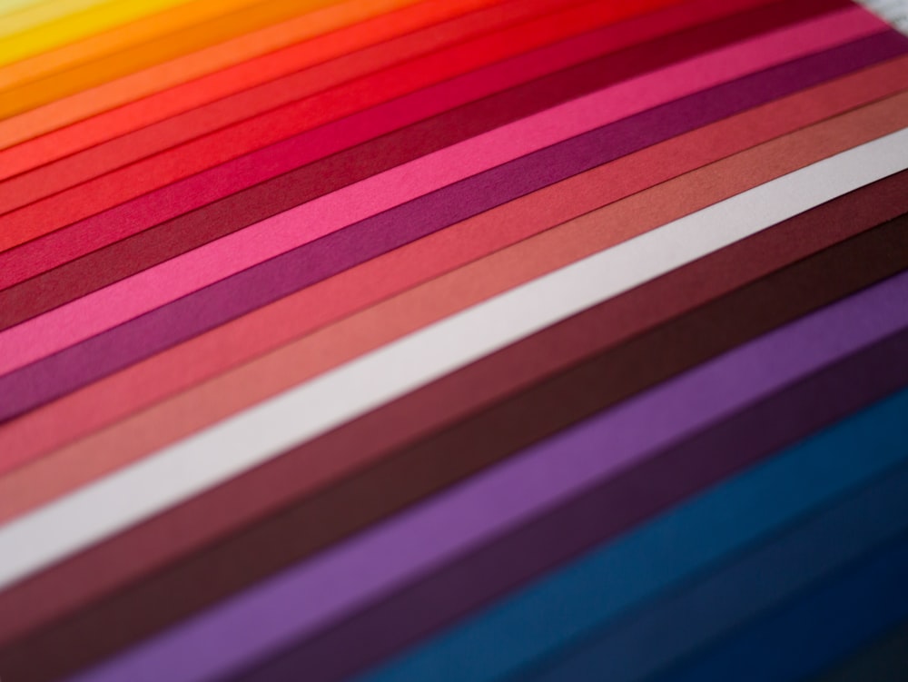 red yellow blue and purple striped textile