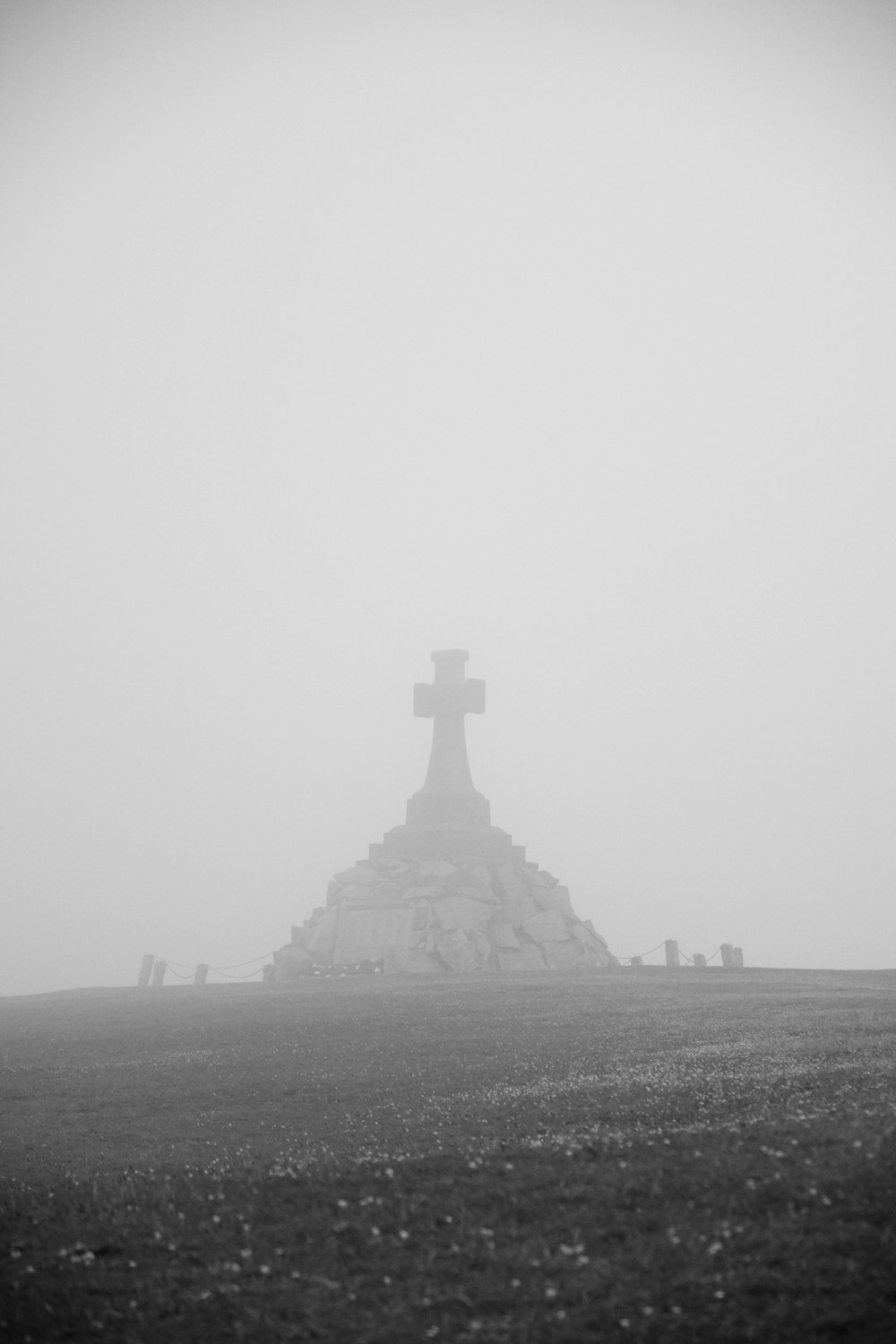 cross on top of a hill