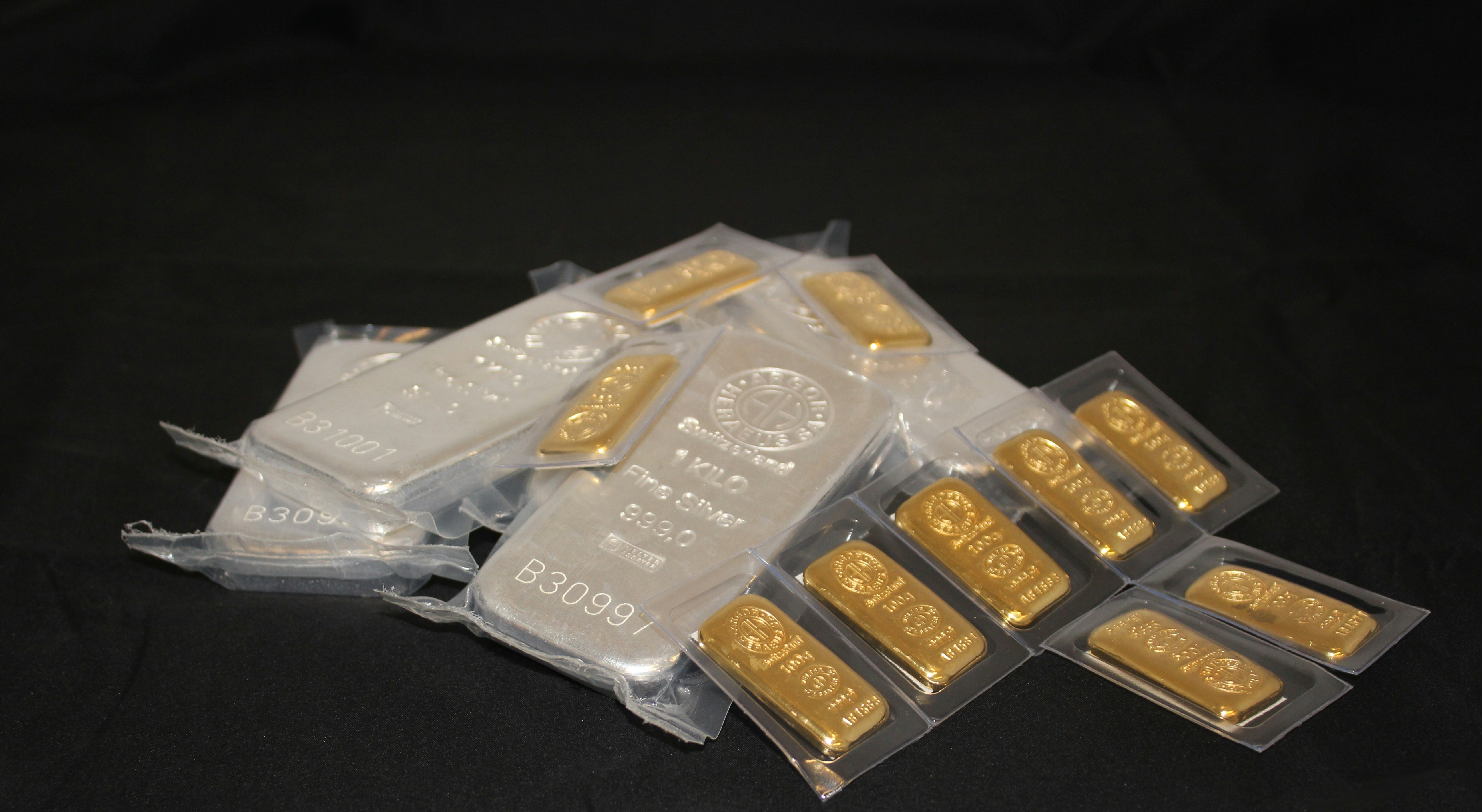 Pile of gold and silver bullion bars Argor Heraeus. If you use our photos, please add credit to https://zlataky.cz, when possible
