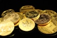 gold coins in a pile symbolizing multiple ways a gold ira can benefit retirement savings