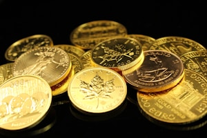 gold coins spread out in a pile representing gold ira for retirement savings