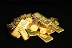 gold coins and bars for a gold ira