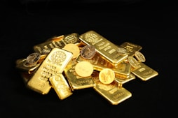 gold bars and coins for a gold ira