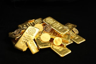 gold bars and coins for a gold ira