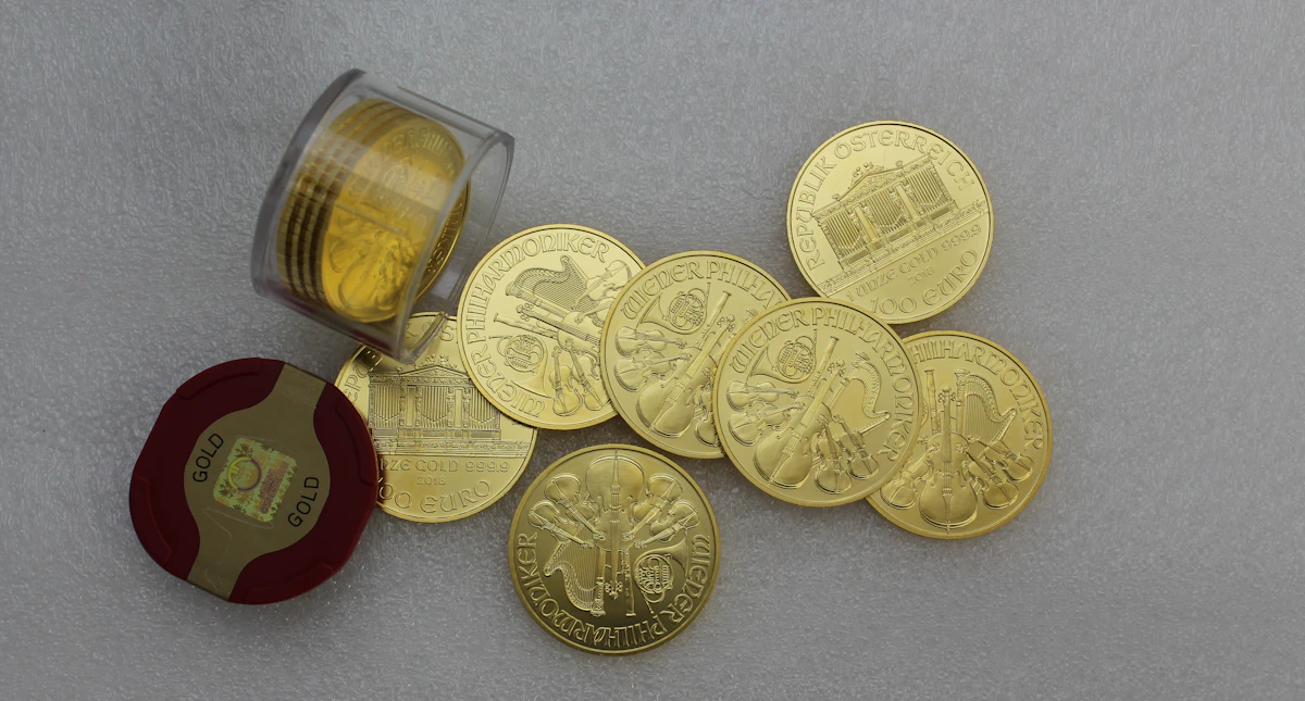 Gold coins on a white table