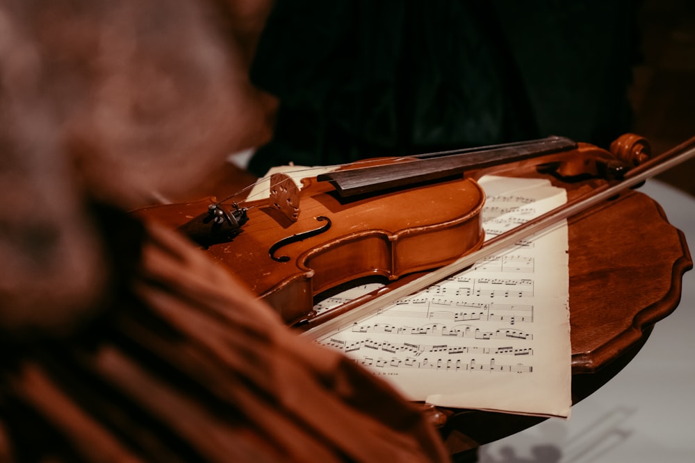 man in black shirt playing violin