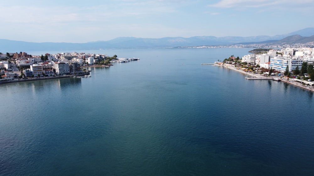 aerial view of city near body of water during daytime