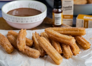 fried fries on white ceramic bowl