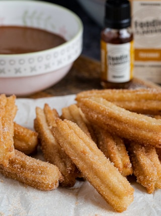 fried fries on white ceramic bowl