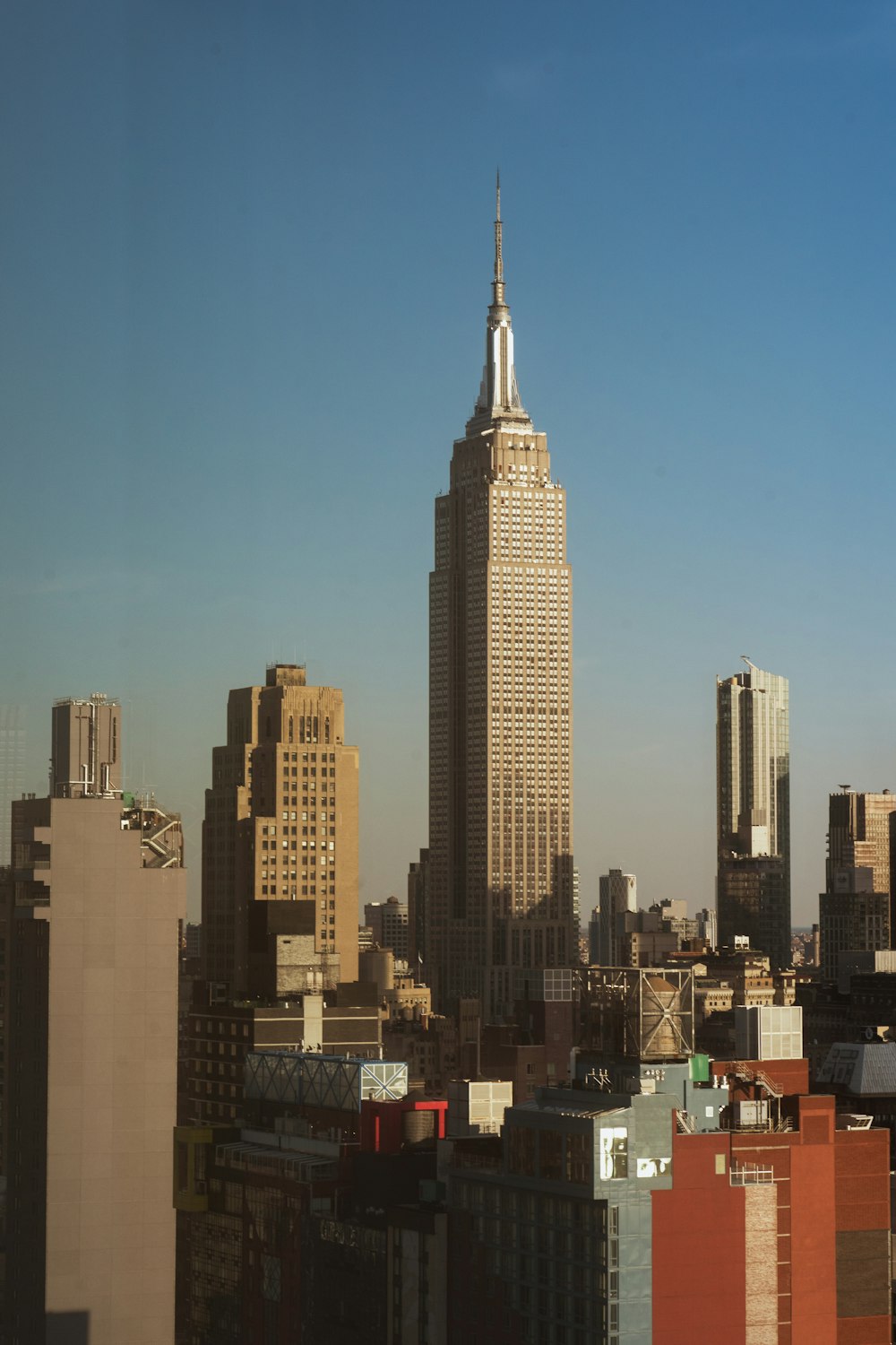 city skyline under blue sky during daytime