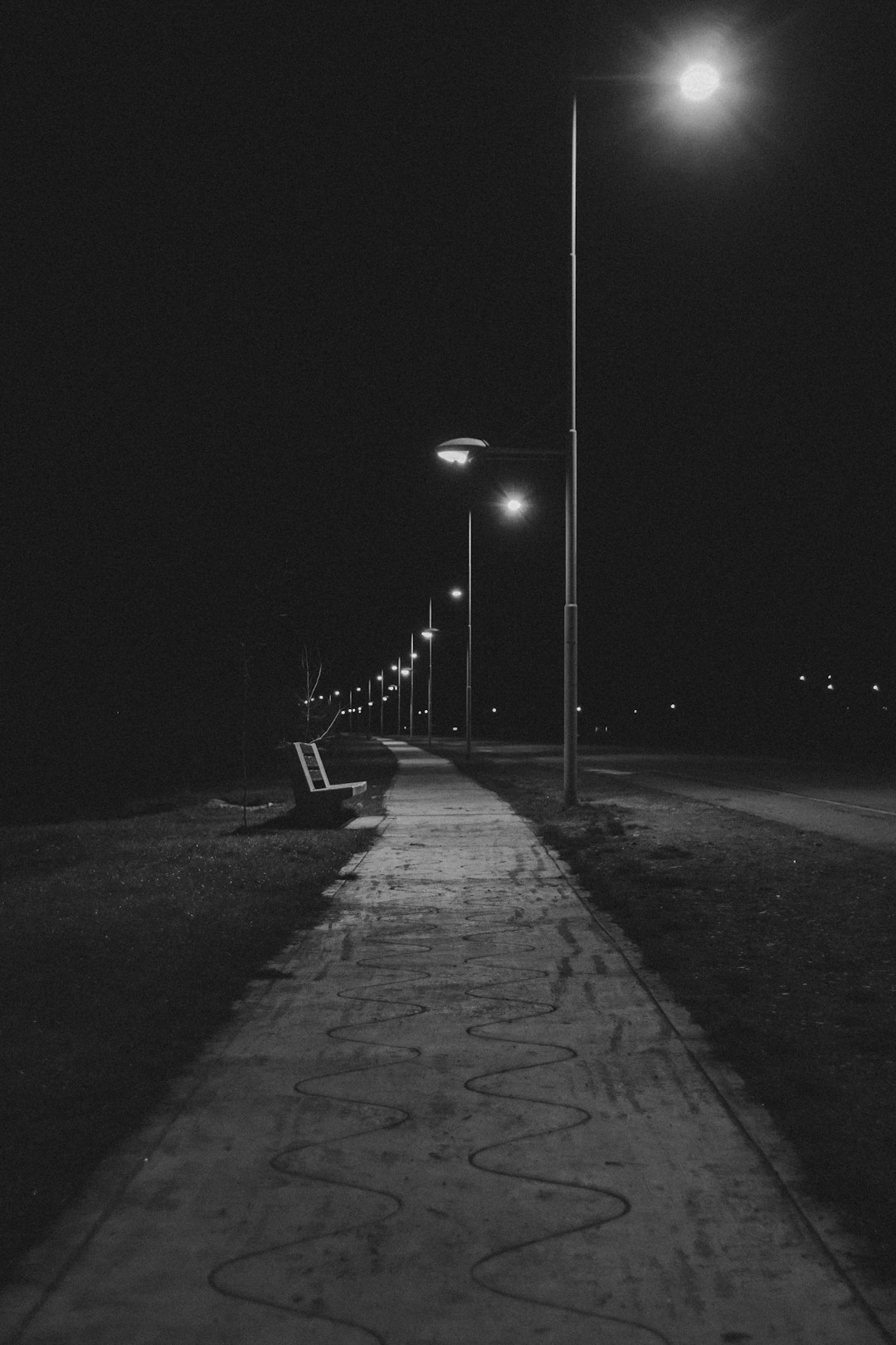 lighted street lamp during night time