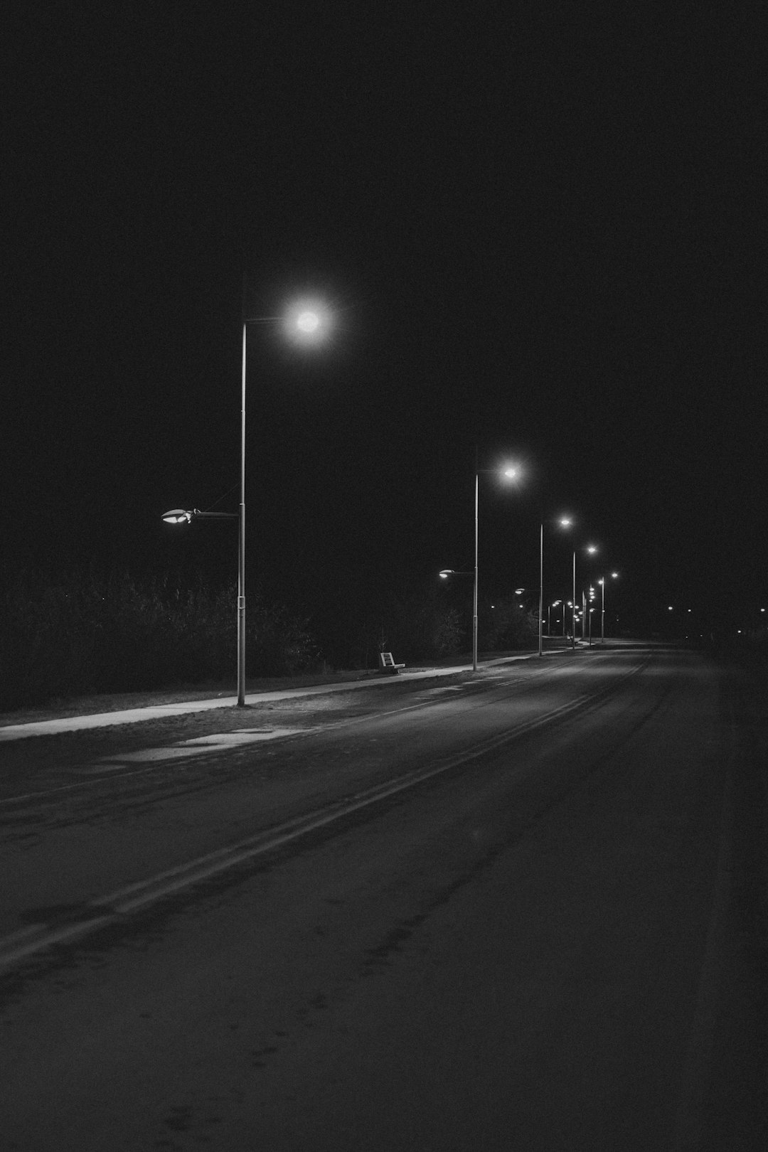 grayscale photo of street lights