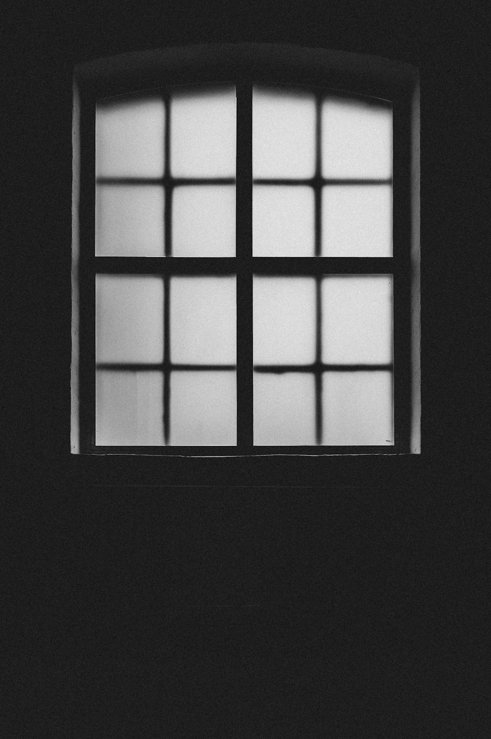 black wooden framed glass window