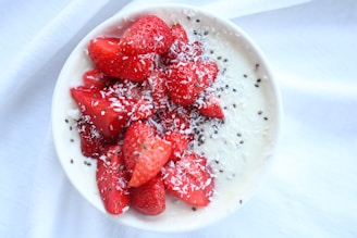 strawberries on white ceramic bowl