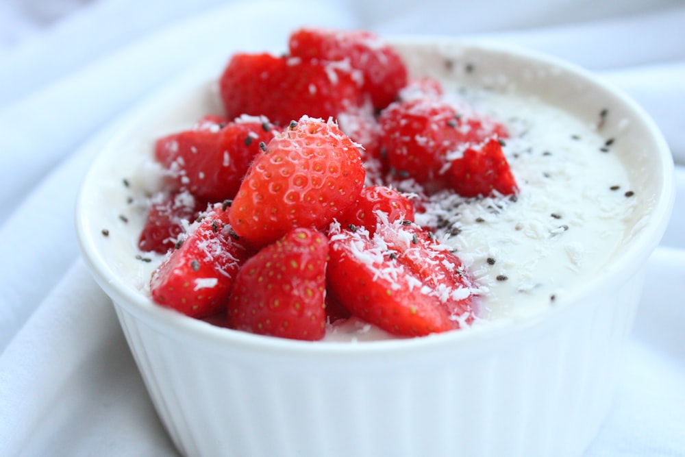 strawberries in white ceramic bowl