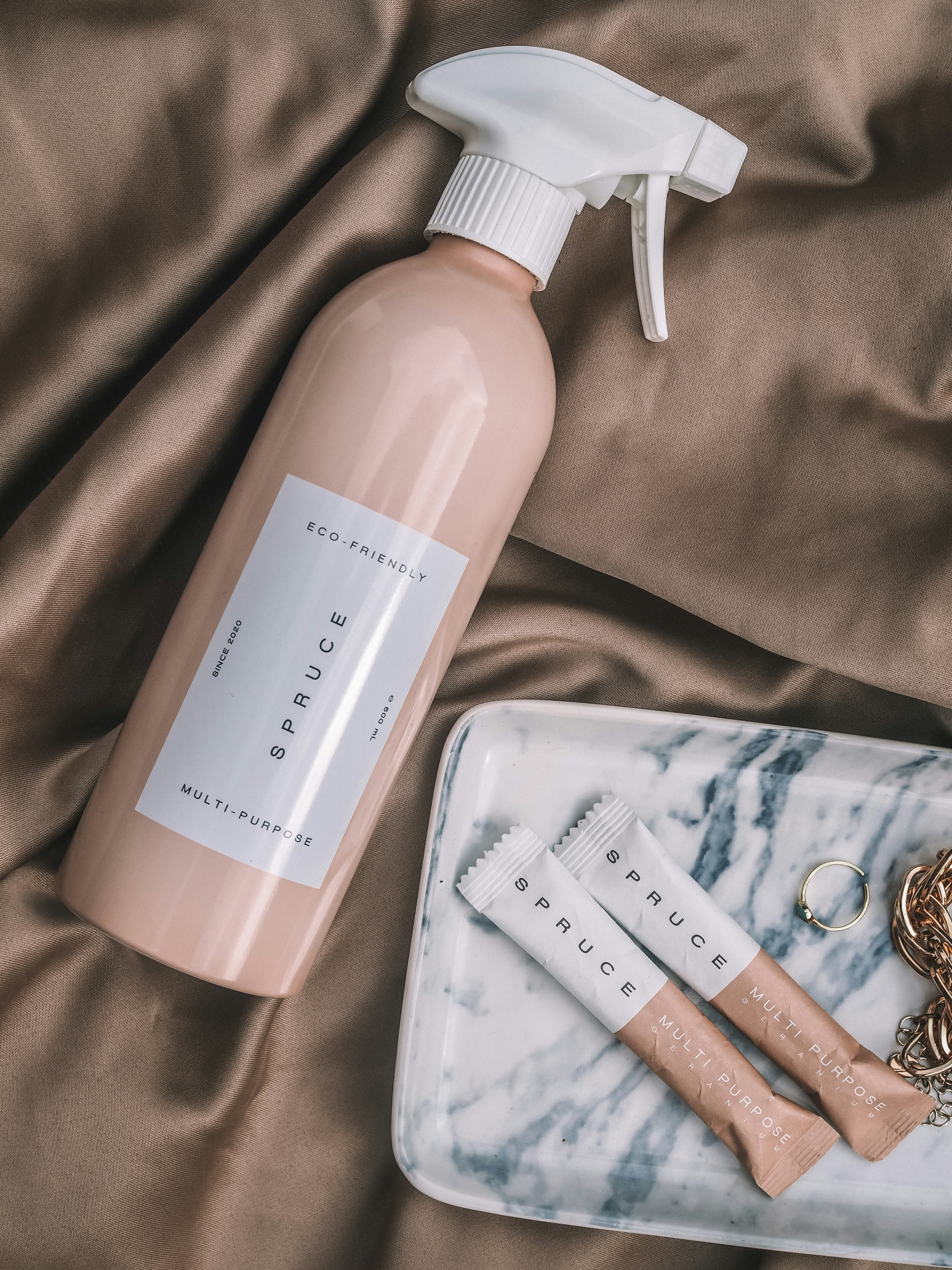 white and pink plastic bottle