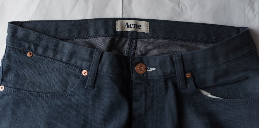 blue denim bottoms on white textile