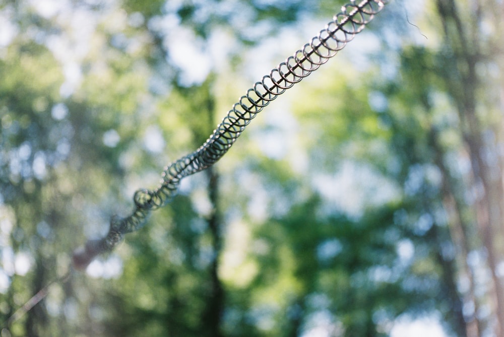 silver chain link fence in tilt shift lens