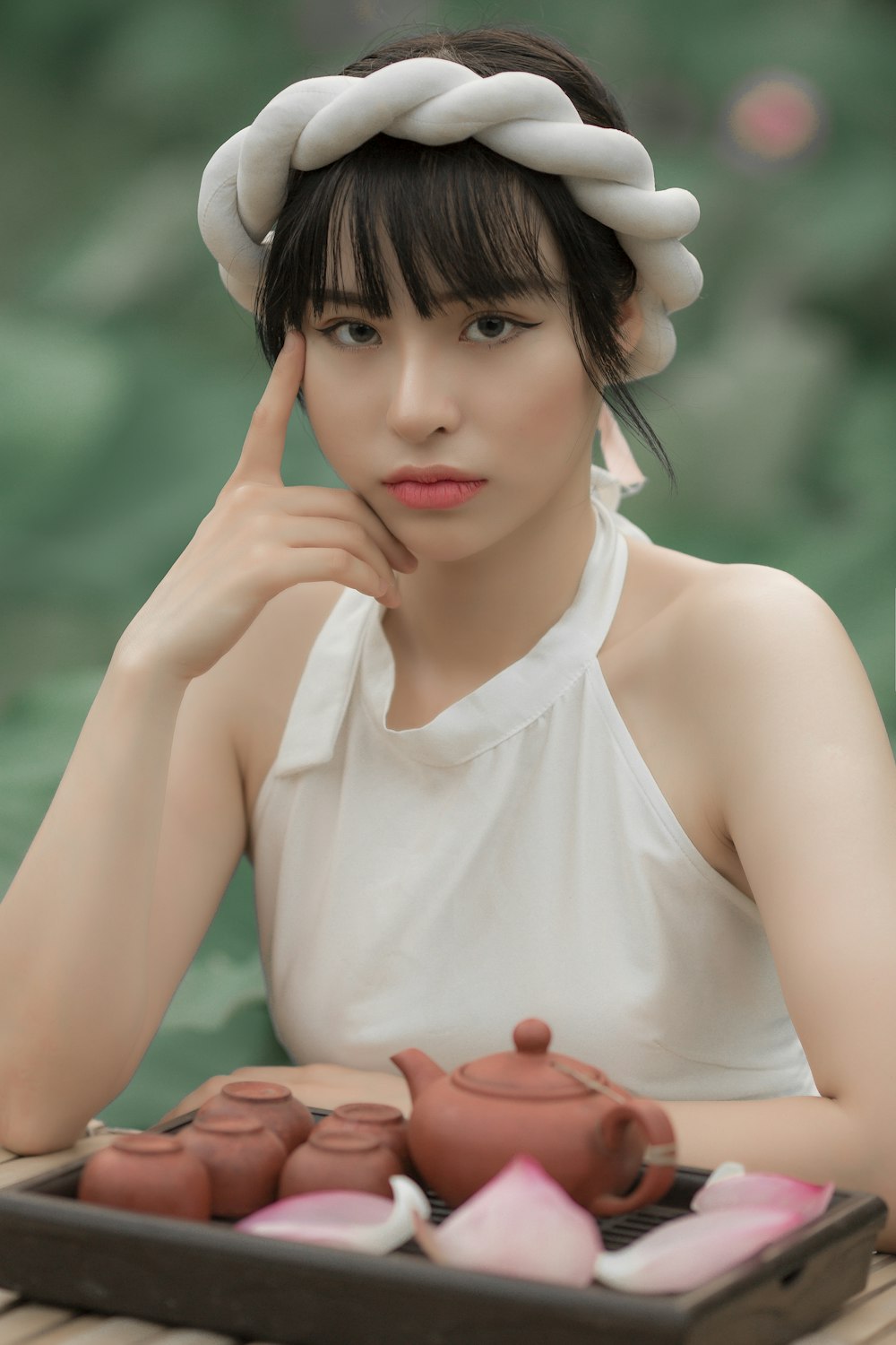 woman in white sleeveless dress