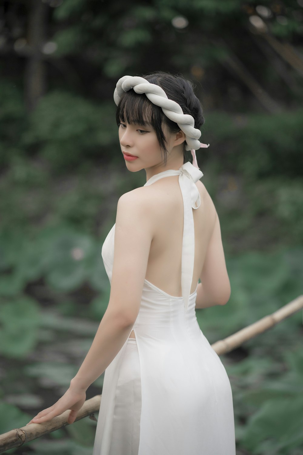 woman in white tank dress