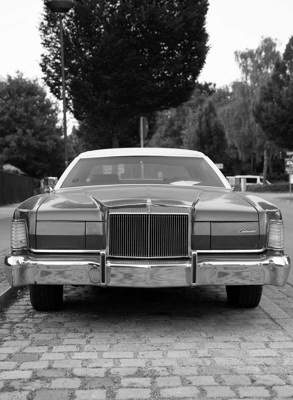 grayscale photo of vintage car